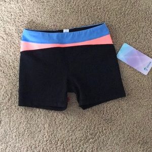Lululemon stretch pants with blue and pink design